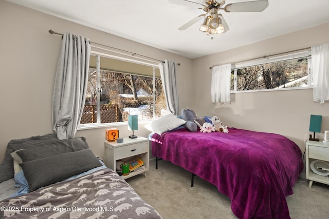 bedroom featuring carpet and a ceiling fan