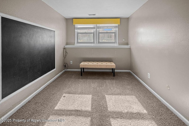 830 Exmoor Rd, Craig, CO 81625 - living area featuring baseboards and carpet flooring