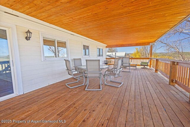 830 Exmoor Rd, Craig, CO 81625 - wooden terrace with outdoor dining area