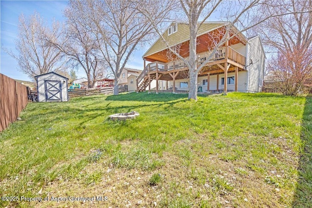 830 Exmoor Rd, Craig, CO 81625 - rear view of property with a wooden deck, a fire pit, and stairway