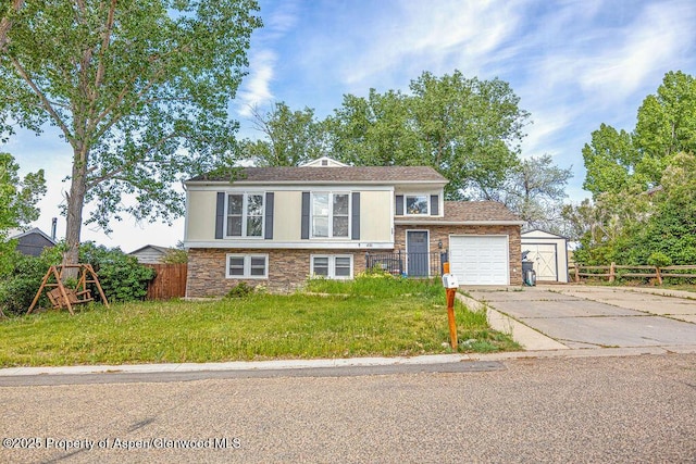830 Exmoor Rd, Craig, CO 81625 - split level home with concrete driveway and a garage