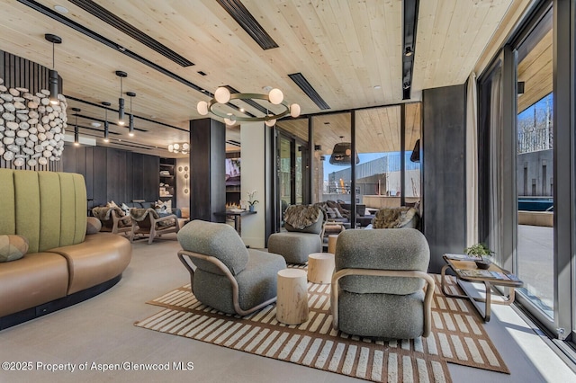 interior space featuring plenty of natural light and a notable chandelier