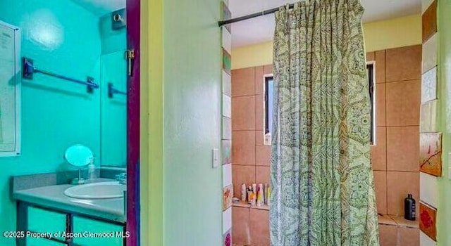 1021 Grand Ave, Glenwood Springs, CO 81601 - full bath with vanity and curtained shower