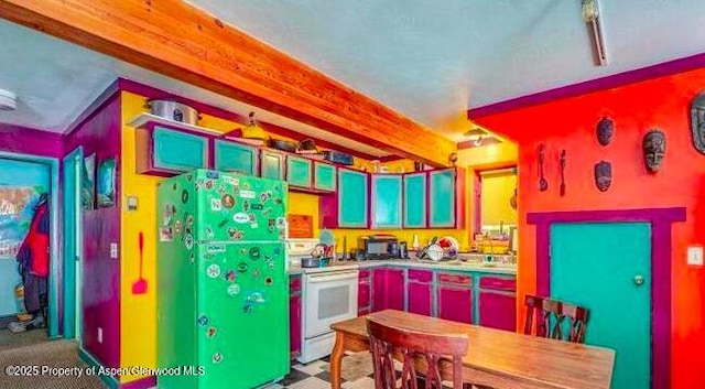 1021 Grand Ave, Glenwood Springs, CO 81601 - kitchen featuring white electric range oven, freestanding refrigerator, and beam ceiling