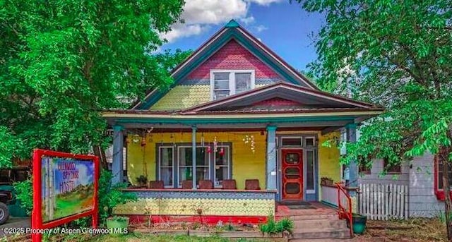 1021 Grand Ave, Glenwood Springs, CO 81601 - view of front facade featuring covered porch