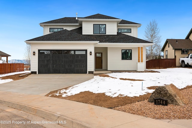 view of front of property featuring a garage