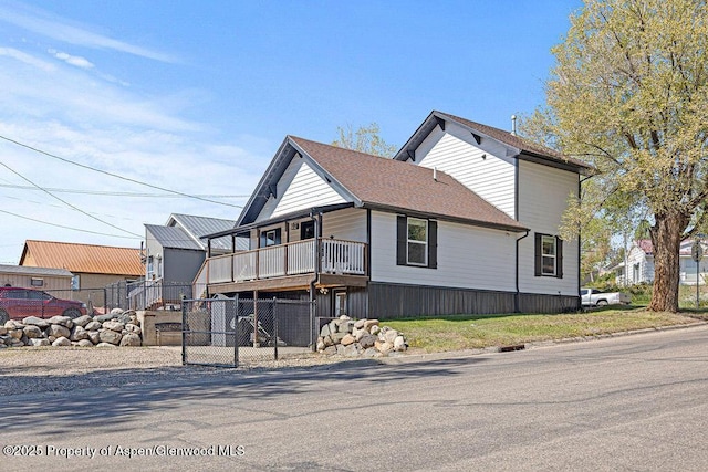949 Breeze St, Craig, CO 81625 - view of side of property with a gate