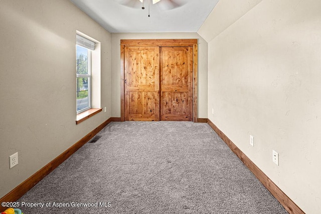 949 Breeze St, Craig, CO 81625 - unfurnished bedroom featuring carpet flooring, baseboards, and a ceiling fan