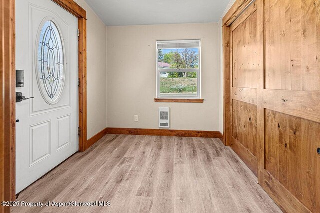 949 Breeze St, Craig, CO 81625 - entrance foyer with heating unit, light wood-style floors, and baseboards