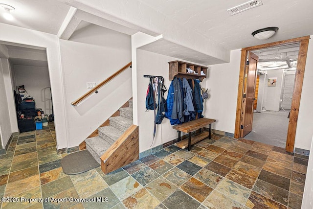 949 Breeze St, Craig, CO 81625 - mudroom with stone tile flooring and baseboards
