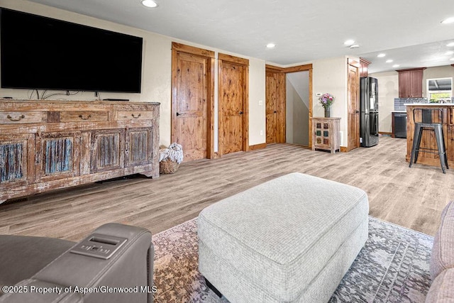 949 Breeze St, Craig, CO 81625 - living room with light wood-style floors and recessed lighting