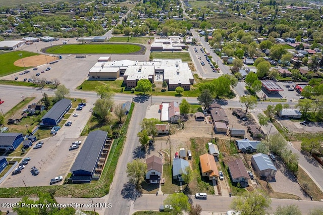 949 Breeze St, Craig, CO 81625 - aerial view of property and surrounding area featuring nearby suburban area
