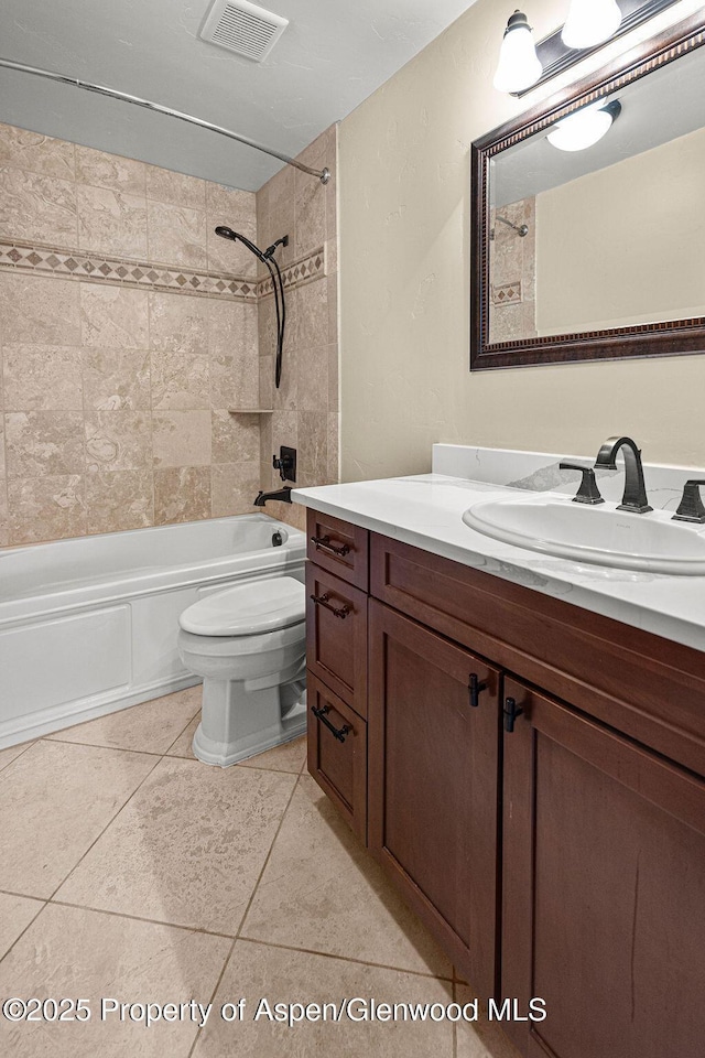949 Breeze St, Craig, CO 81625 - bathroom with bathing tub / shower combination, vanity, toilet, and tile patterned flooring