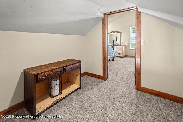 949 Breeze St, Craig, CO 81625 - bonus room featuring carpet floors, baseboards, and lofted ceiling