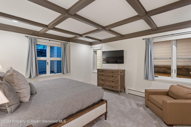 bedroom featuring light carpet, beam ceiling, a baseboard radiator, and coffered ceiling