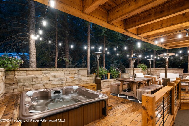 exterior space featuring a hot tub