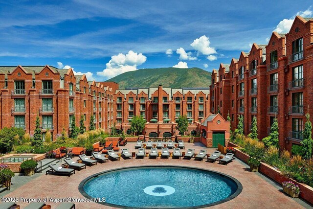 315 E Dean St Unit B30, Aspen, CO 81611 - view of pool featuring a mountain view