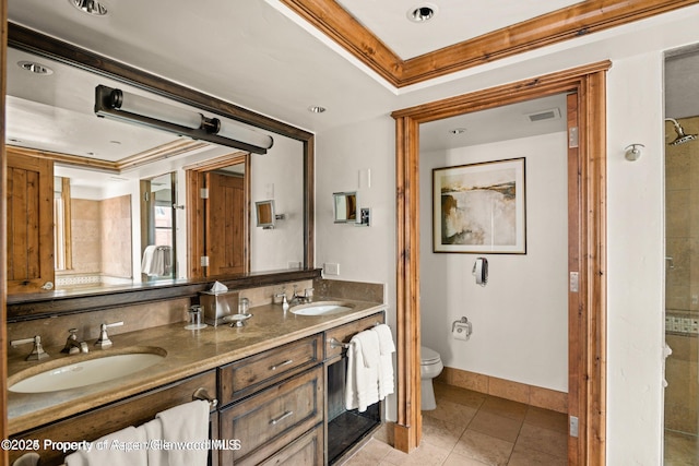 315 E Dean St Unit B30, Aspen, CO 81611 - bathroom with double vanity, tile patterned flooring, crown molding, and a shower