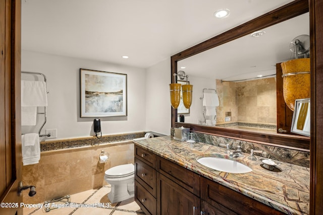 315 E Dean St Unit B30, Aspen, CO 81611 - full bathroom featuring vanity, tile patterned floors, recessed lighting, a shower, and tile walls