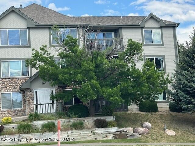 796 Castle Valley Blvd Unit J, New Castle, CO 81647 - view of front of home featuring stone siding