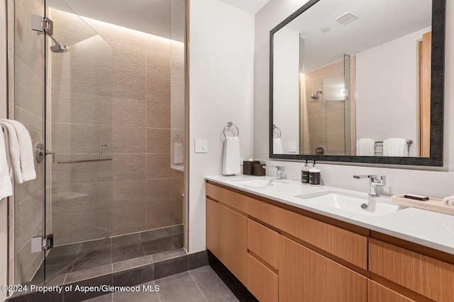 77 Wood Rd Unit 506, Snowmass Village, CO 81615 - bathroom with a shower stall, double vanity, and tile patterned floors