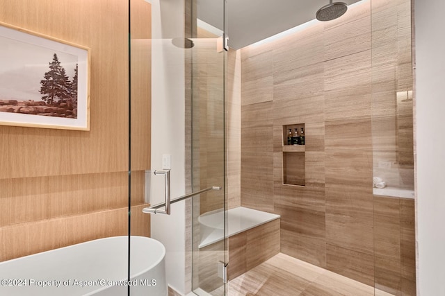 77 Wood Rd Unit 506, Snowmass Village, CO 81615 - bathroom featuring a shower stall, a freestanding bath, and a sauna / steam room