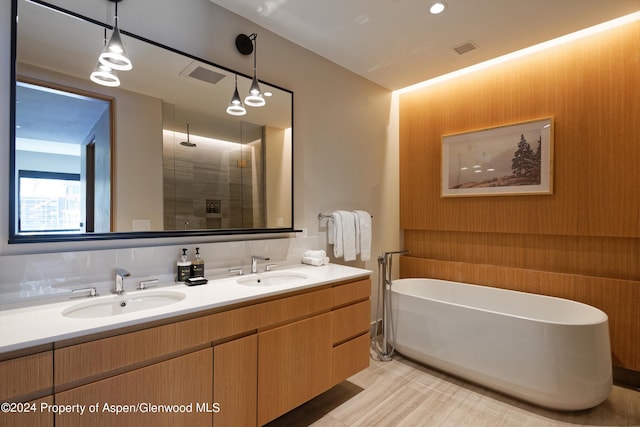 77 Wood Rd Unit 506, Snowmass Village, CO 81615 - full bathroom with a soaking tub, double vanity, and a tile shower