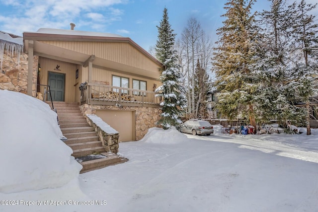 view of front of property with a garage