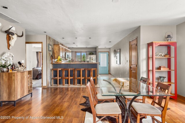 1472 W Main St, Carbondale, CO 81623 - dining room with light wood-type flooring and baseboards