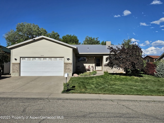 1650 Dogwood Dr, Rifle, CO 81650 - single story home featuring brick siding, driveway, a garage, a front yard, and metal roof
