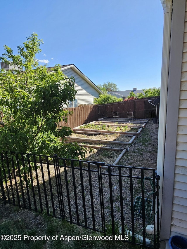1650 Dogwood Dr, Rifle, CO 81650 - view of yard featuring a vegetable garden