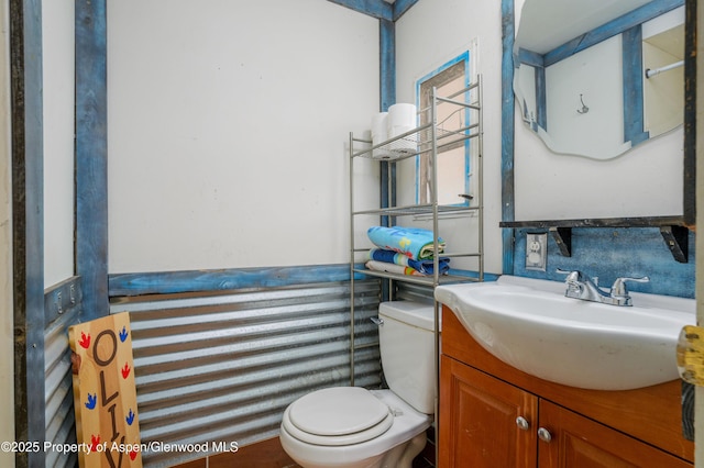 265 SW 11th Ave, Cedaredge, CO 81413 - bathroom featuring toilet and vanity