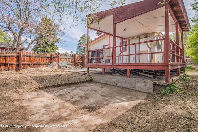 265 SW 11th Ave, Cedaredge, CO 81413 - back of property with a deck and a patio area