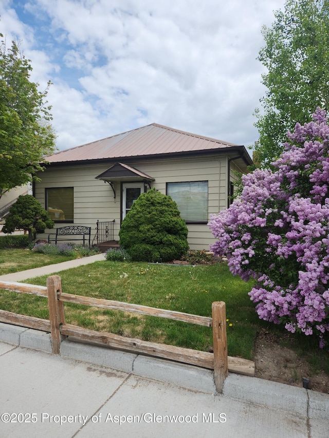 view of front of house featuring metal roof