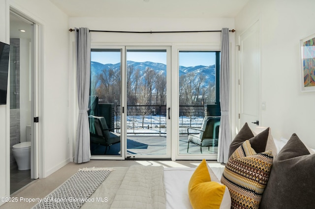 entryway with a mountain view and plenty of natural light