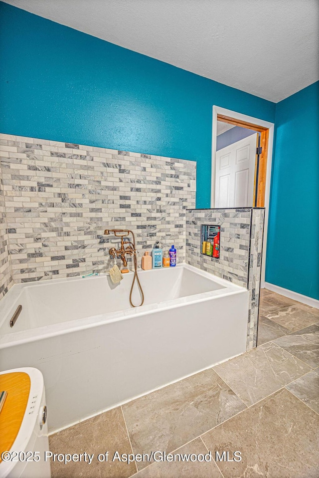 bathroom with a washtub