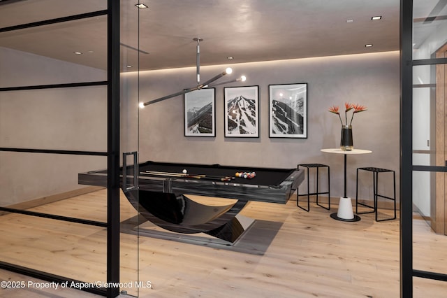 411 Pearl Ct, Aspen, CO 81611 - playroom featuring wood finished floors