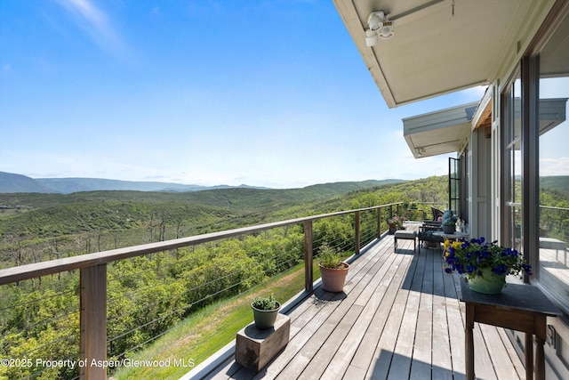 2240 Old Herron Rd, Basalt, CO 81621 - wooden deck with a mountain view and a wooded view