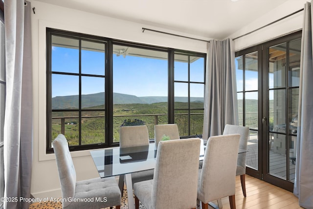 2240 Old Herron Rd, Basalt, CO 81621 - dining area with a mountain view, healthy amount of natural light, and light wood-style floors
