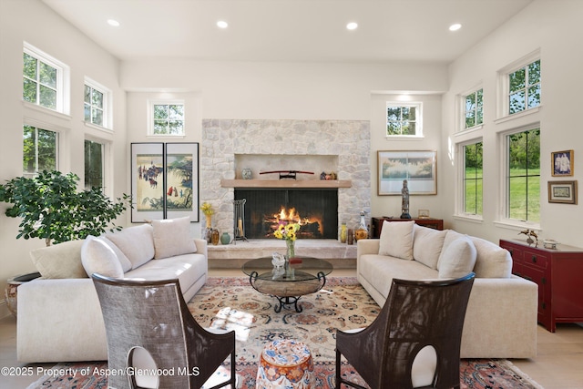 2240 Old Herron Rd, Basalt, CO 81621 - living room with recessed lighting, wood finished floors, a towering ceiling, and a fireplace