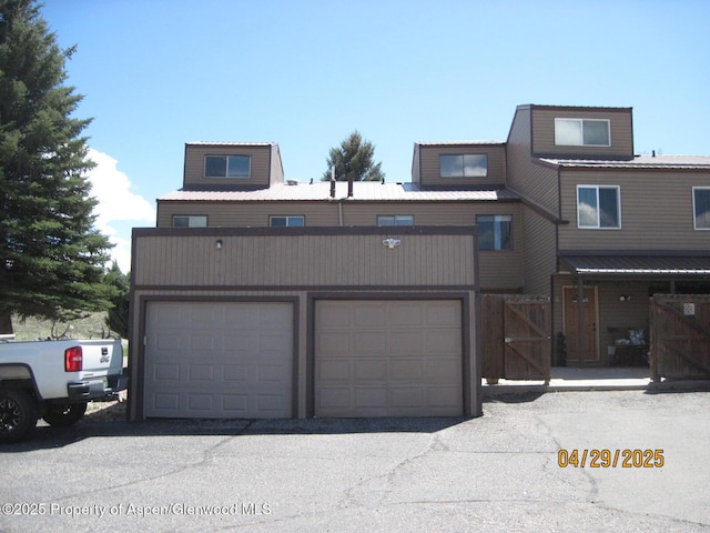 multi unit property featuring metal roof