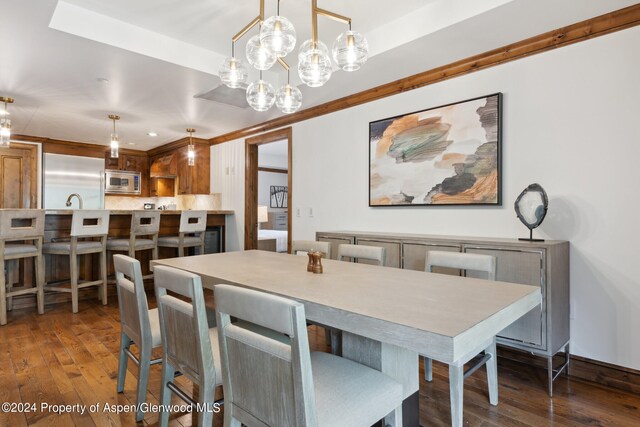 dining room with dark wood-type flooring