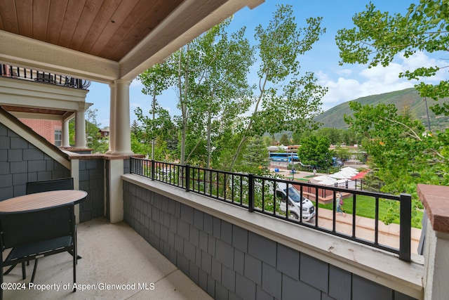 balcony featuring a mountain view