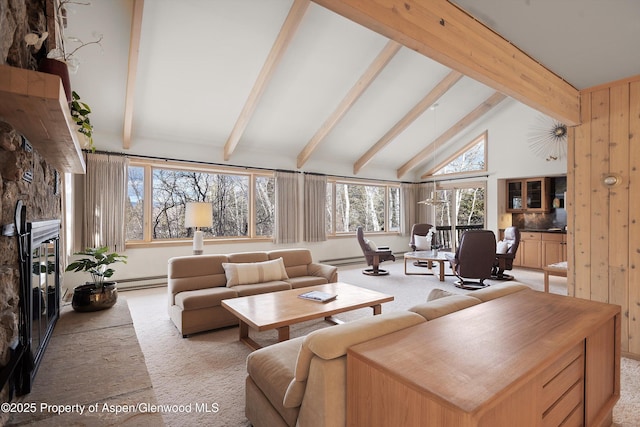 living room featuring beam ceiling, high vaulted ceiling, baseboard heating, and a fireplace