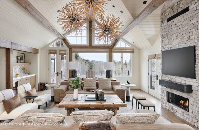 1271 Ute Ave, Aspen, CO 81611 - living room with a fireplace, light wood finished floors, a wooden ceiling with exposed beams, and high vaulted ceiling