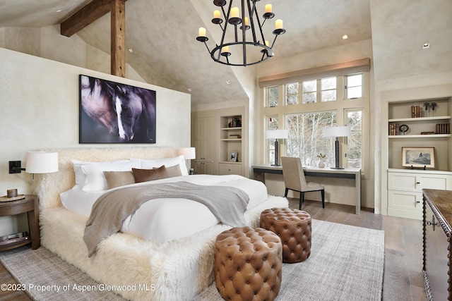 1271 Ute Ave, Aspen, CO 81611 - bedroom featuring high vaulted ceiling, wood finished floors, a chandelier, beamed ceiling, and an office area