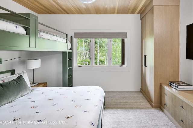 1271 Ute Ave, Aspen, CO 81611 - bedroom featuring light colored carpet and wood ceiling