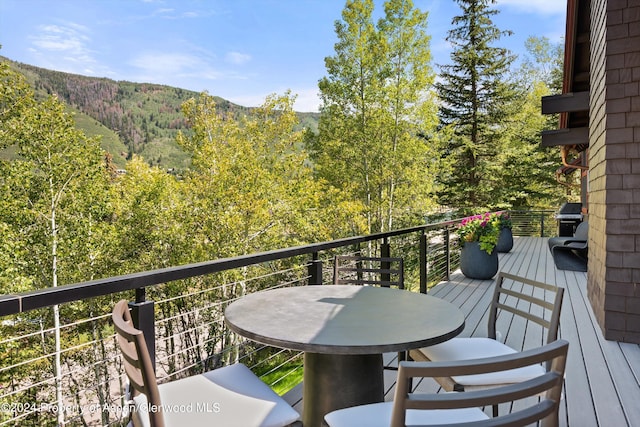 1271 Ute Ave, Aspen, CO 81611 - balcony with a mountain view, area for grilling, and a wooded view