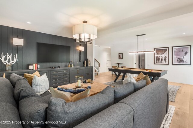 1271 Ute Ave, Aspen, CO 81611 - living area featuring stairway, light wood-style flooring, billiards, wood walls, and recessed lighting