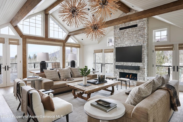 1271 Ute Ave, Aspen, CO 81611 - living area with french doors, beam ceiling, a stone fireplace, high vaulted ceiling, and light wood-style flooring